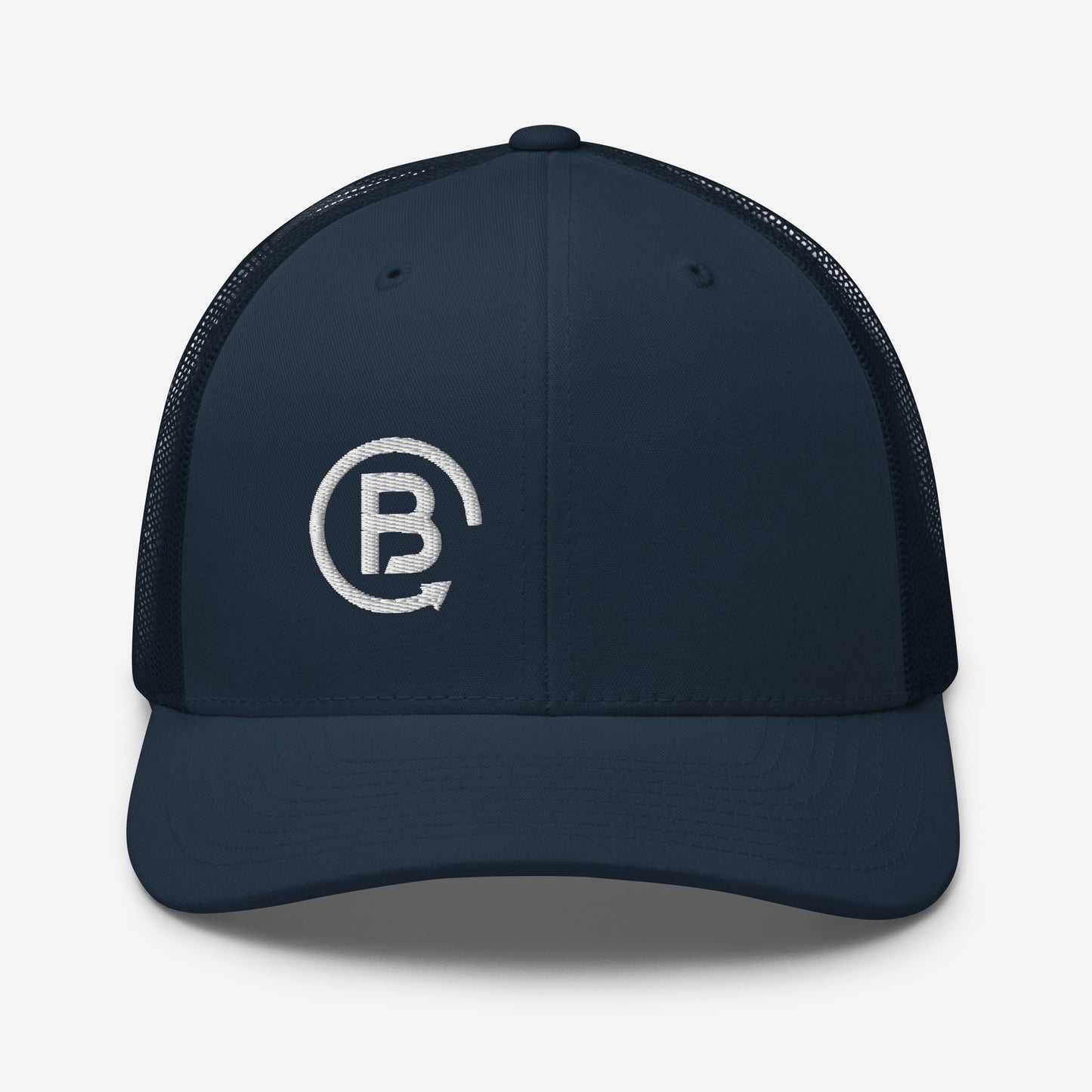 Navy trucker hat with a B logo design on the right front panel.